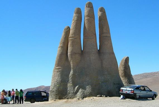 Illustration for article titled A mysterious, giant hand rises from the Chilean desert